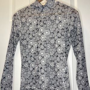 Levi’s mesh turtle neck floral pattern top. Never worn
